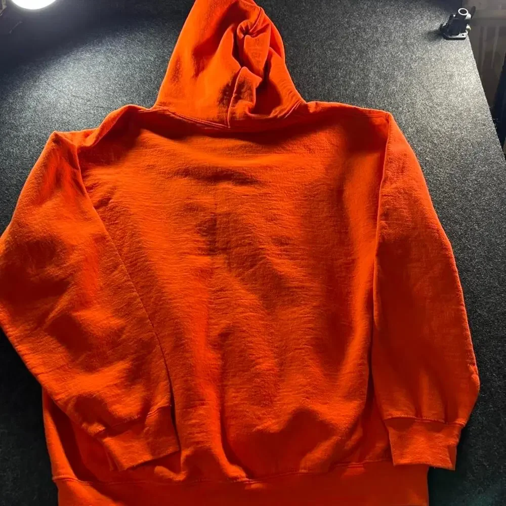 Justice orange hoodie with multicoloured design Size L